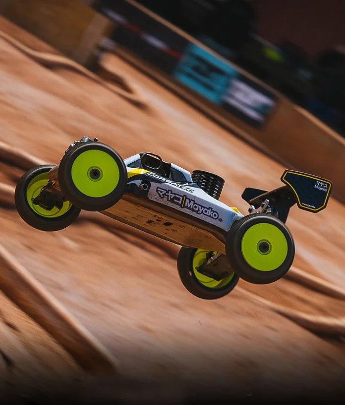 RC car flying through the air on track